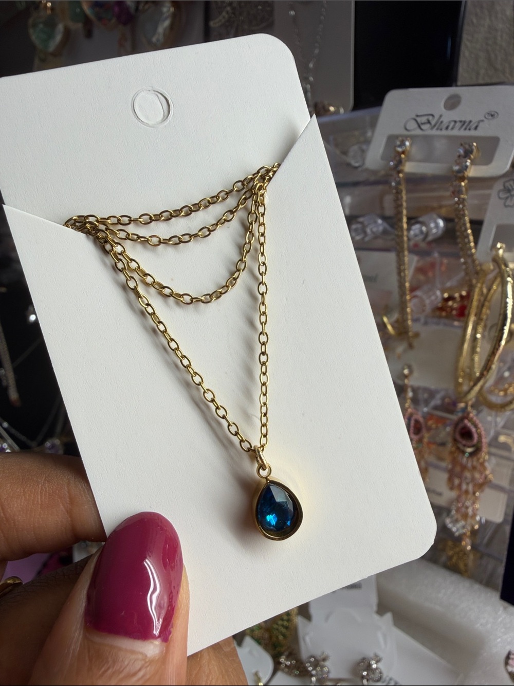 Gold Layered Necklace with Blue Teardrop Pendant